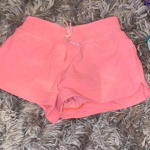 Neon pink athletic shorts